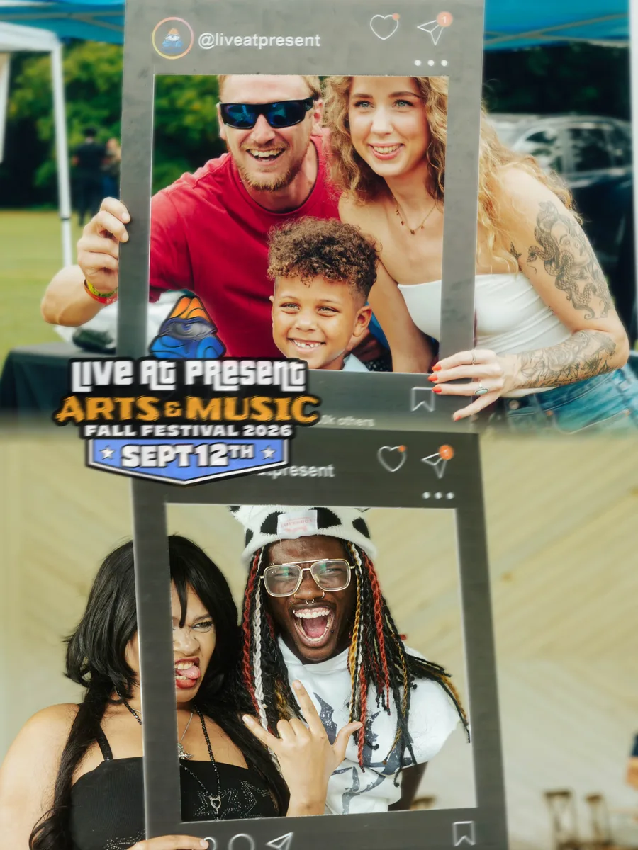 Festival guests posing with the Live At Present photo frame