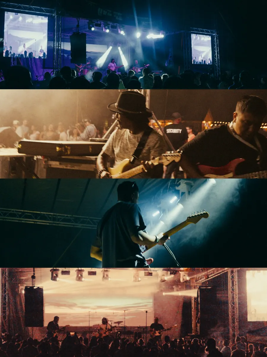 Live musicians performing on the festival stage before the evening crowd